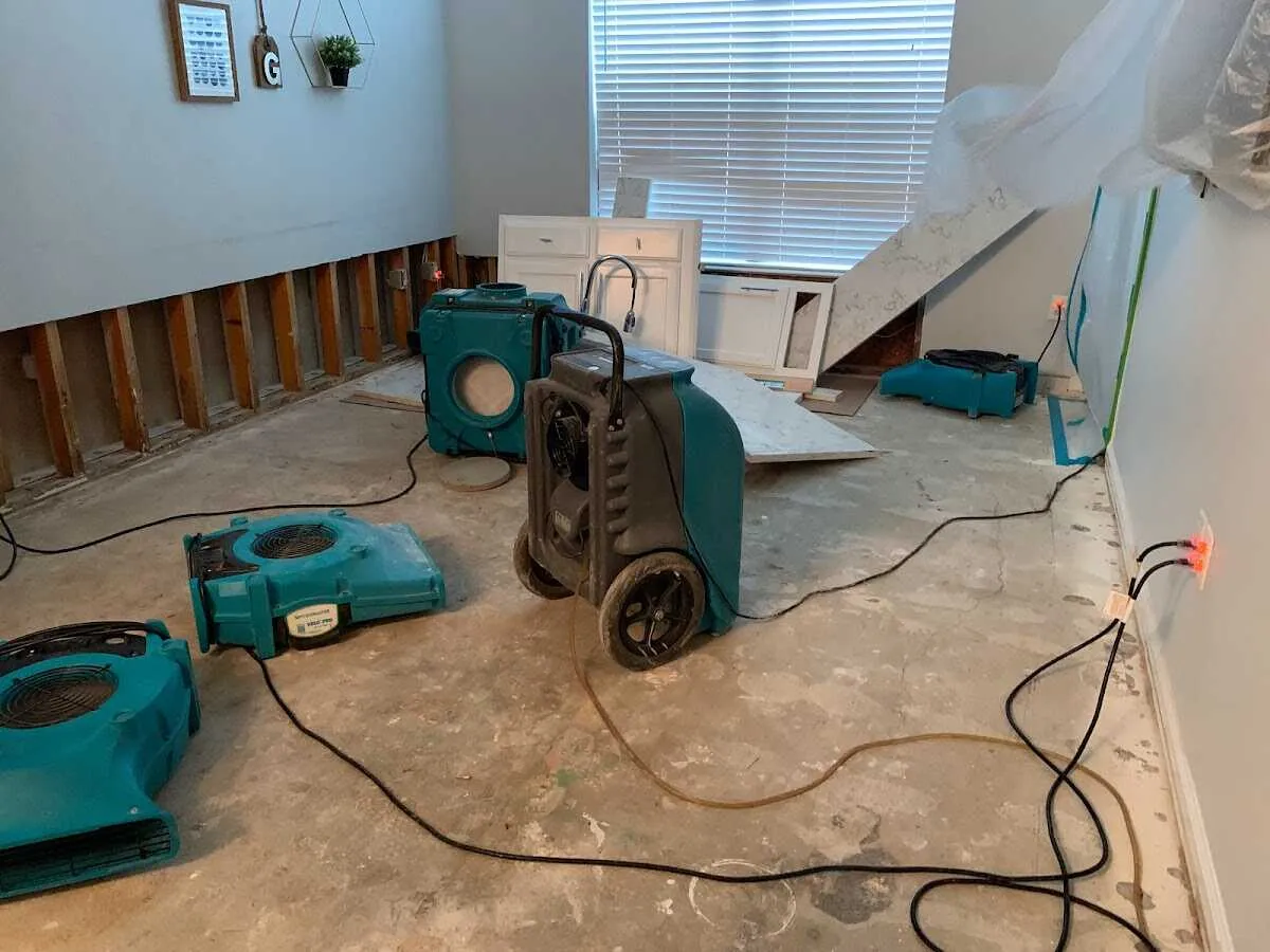 Dehumidifier in flood-cut room for Water Damage Restoration in Chanute